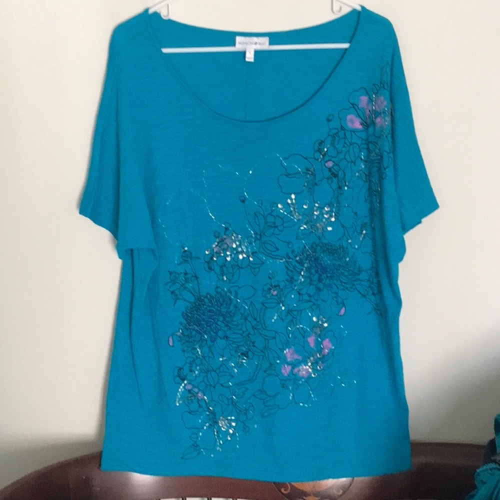 It’s a pretty blingy tee from Fashion Bug. Size L